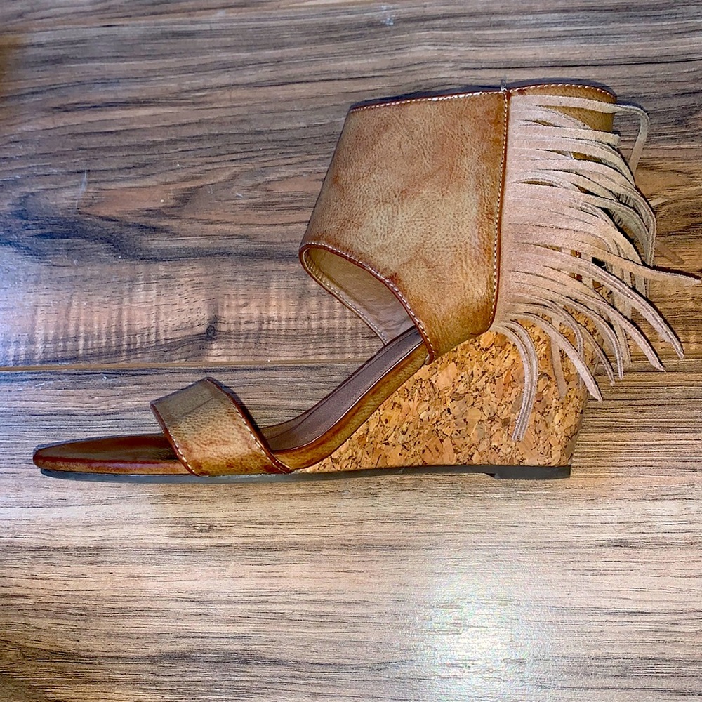 Light brown leather Rampage wedges with a fringe